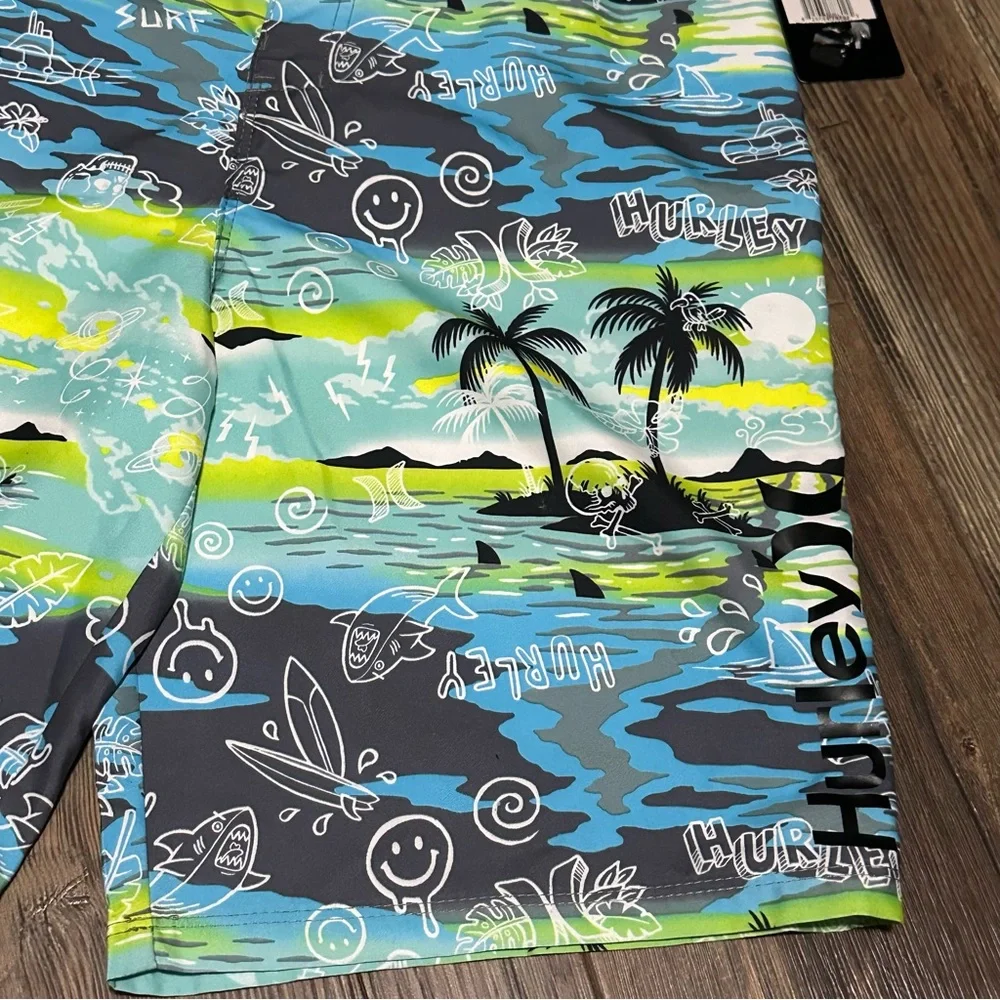 Hurley blue lazer tropical board shorts Swim trunks size 20 /30